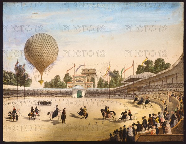 Hot-air balloon above a racecourse