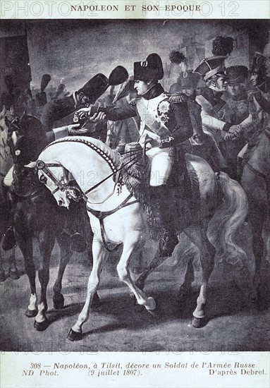 Napoleon I in Tilsit giving an award to a soldier of the Russian army.
9th July 1807