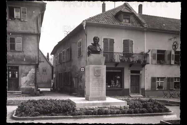 Bust of Marshal Lefebvre in a village square.