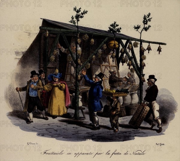 Fruit and vegetable vendor decorating his stand for Christmas