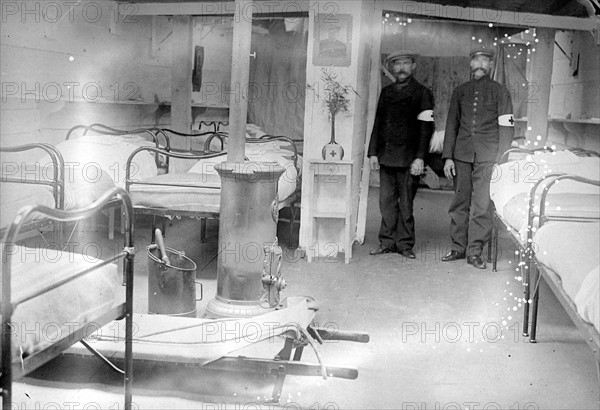 Inauguration of a train of ambulance-boats.  Inside a barge