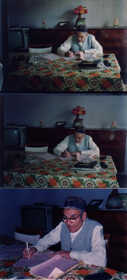 Mohamed Kaddar writings his memoirs.