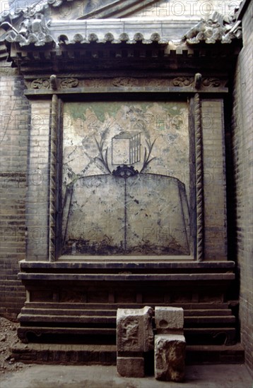 Décoration sur un mur à Pingyao