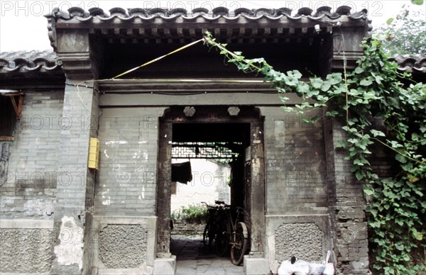 Quartier des "Hutong" (ruelles) à Pékin, portail d'entrée de la cour