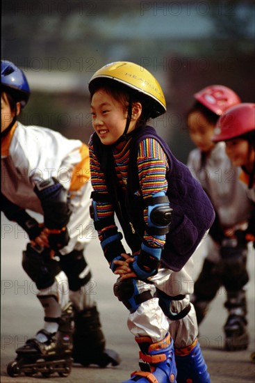 Jeunes chinois pendant un cours d'éducation physique