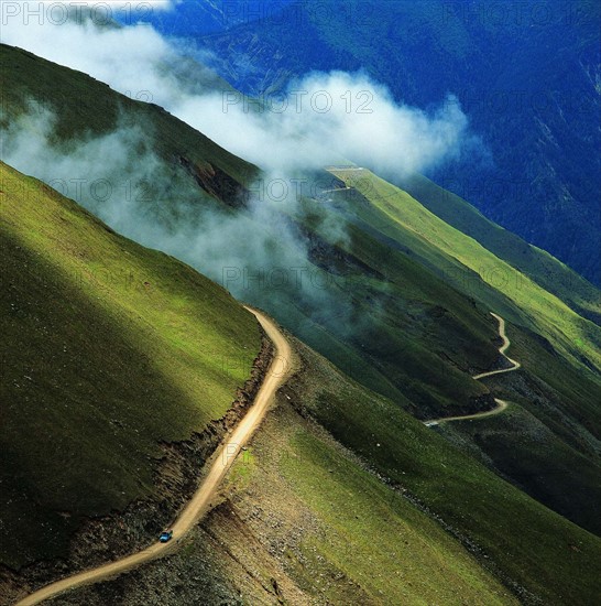 The winding road on the Mount Balang,Sichuan Province,China