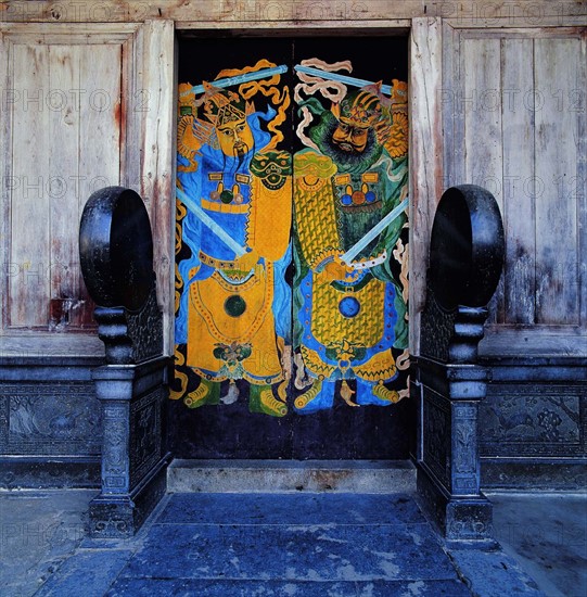 The traditional folk art of Chinese Door Gods who are said to be protecting the residence on a gate of Yixian County,Anhui Province,China