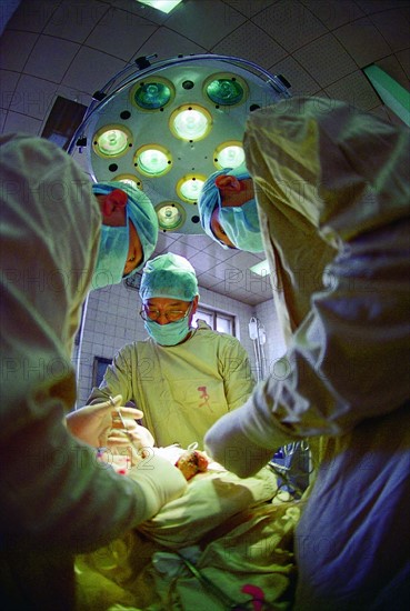 Doctors are doing an operation for a patient