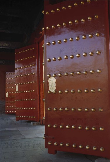 The knobs on the red painted gate of the Forbidden City,Beijing,China