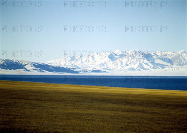 snow-covered mountains by the Sayram Lake,Sinkiang,China