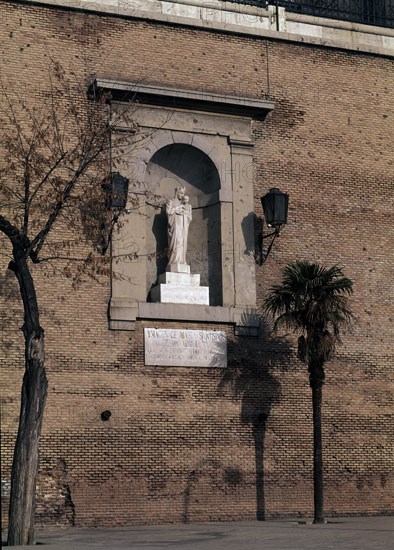 An image of the Virgin of Almudena set into a wall