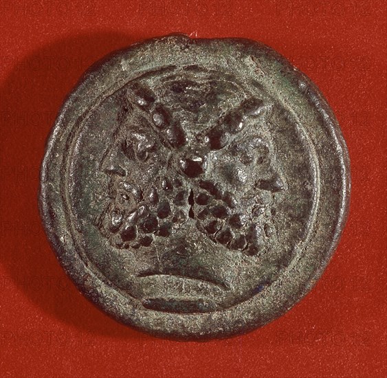 *MONEDA DE BRONCE - JANO REY DE LACIO (BIFRONTE) - S IV A JC
ROMA, MUSEO DE LAS TERMAS
ITALIA