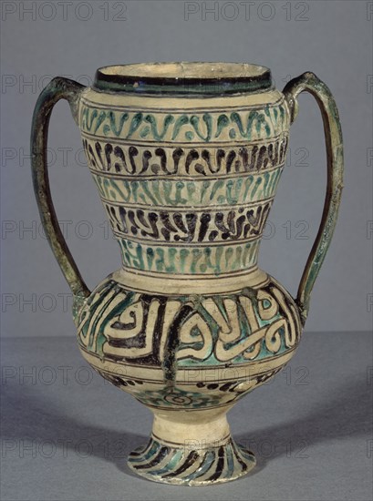 JARRA NAZARI DE CUERDA SECA CON DECORACION EPIGRAFICA NASJI-S XIV-XV(OTRA VISTA EN 80084)
GRANADA, MUSEO HISPANO-MUSULMAN
GRANADA