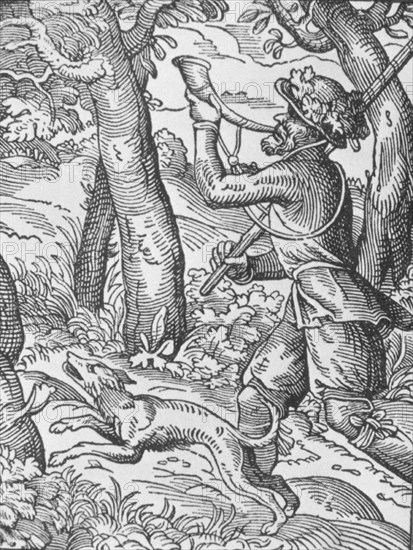 CAZADOR TOCANDO EL CUERNO DE CAZA