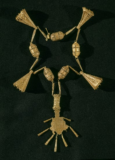 COLLAR DE ORO HISPANOMUSULMAN -TESORO DE BENTARIQUE -ALMERIA -
MADRID, MUSEO ARQUEOLOGICO NACIONAL
MADRID
This image is not downloadable. Contact us for the high res.
