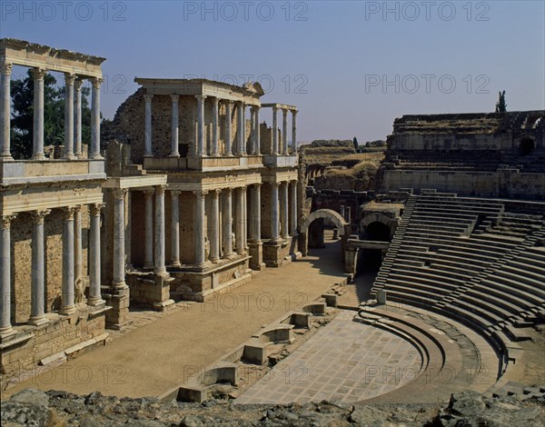 Roman Theater : Lateral view of the scene, of the pit and of the tiers divided into sectors in Merida
