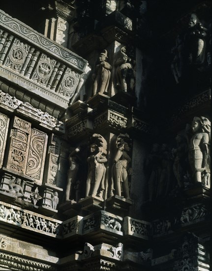 DET RELIEVES DE ESTILO INDOARIANO DEL MURO DE UN TEMPLO-
KHAJURAHO, EXTERIOR
INDIA
This image is not downloadable. Contact us for the high res.