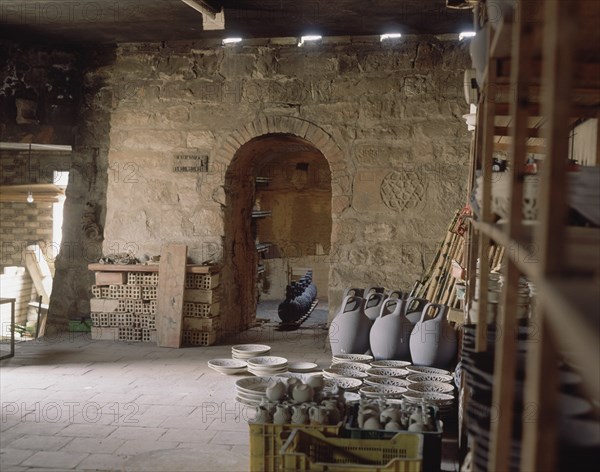 INTERIOR DEL ALMACEN Y AL FONDO EL HORNO ARABE - ARTE POPULAR DE TRADICION ANDALUSI
UBEDA, CERAMICA TITO
JAEN

This image is not downloadable. Contact us for the high res.