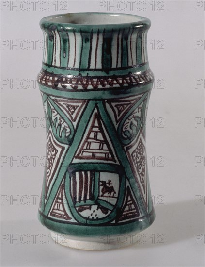 BOTE DE FARMACIA VIDRIADO Y DECORADO AL MODO ARABE DEL S XV-ARTE POPULAR
TERUEL, COLECCION PARTICULAR
TERUEL