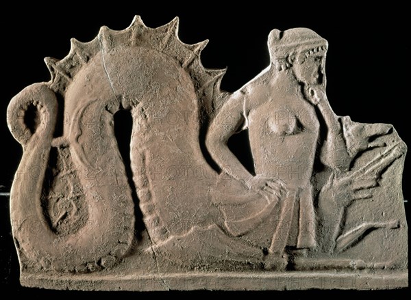 Low-relief showing Scylla