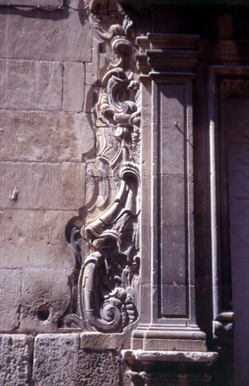 EXTERIOR - DETALLE DE LA DECORACION DE UNA PORTADA LATERAL - S XVII
ALICANTE, COLEGIATA SAN NICOLAS BARI
ALICANTE

This image is not downloadable. Contact us for the high res.