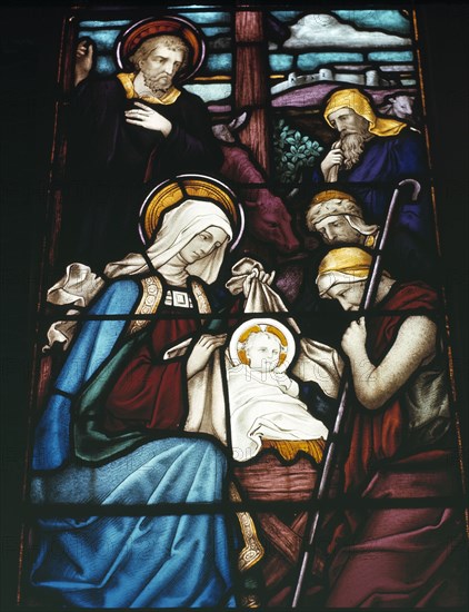 Stained glass window depicting the Nativity scene
