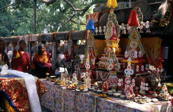 Elaborate offerings under the Bodhi Tree, site of Buddhas enlightenment at Bodhgaya, India