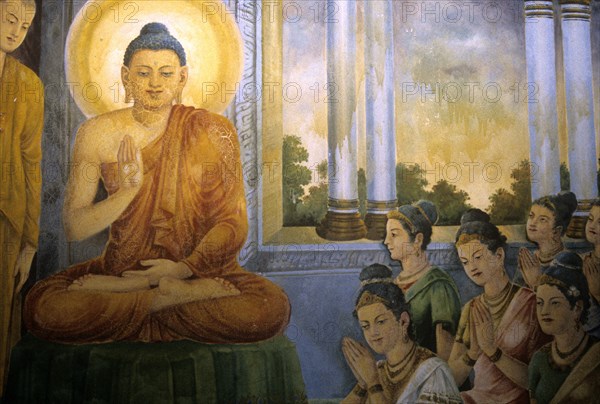 Buddha ordaining his mother-in-law woman in white