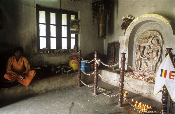 Shrine with bas relief birth of the Buddha at Lumbini, his birthplace in India