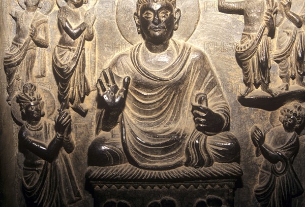 Bronse relief of seated Buddha, Gandhara 3BC, Lahore Museum Pakistan