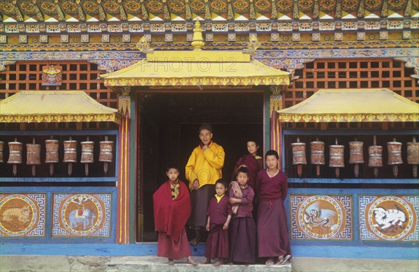 Child monks at the door of Labrang Monastery in Sikkim