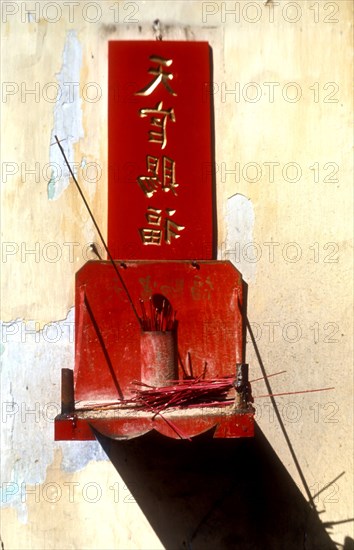 Joss sticks outside a Chinese house in Penang