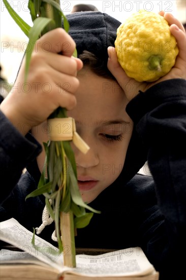 Jewish boy with `four kinds` Succot festival in Israel