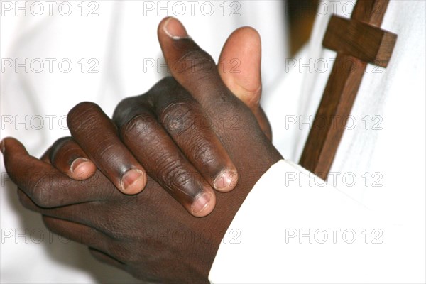 Preist hand catholic church chad cross wodden fingernails religions preacher african