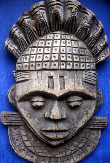 AShante tribal mask used in tribal initiation ceremonies and other practices. West Africa.