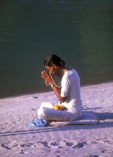 Brahmin worships near source of the Ganges