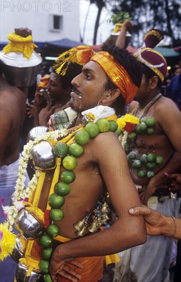 Hindu man with piercings at Thai Pusam in Kuala Lumpur