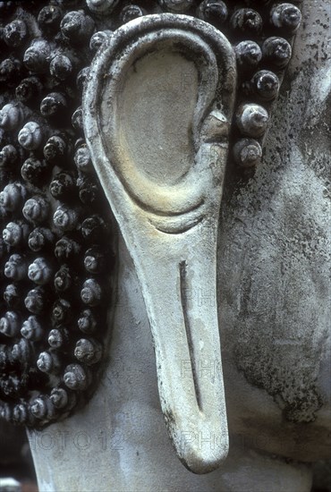 Ear of Buddha giant statue at Wat Mathathat in Thailand