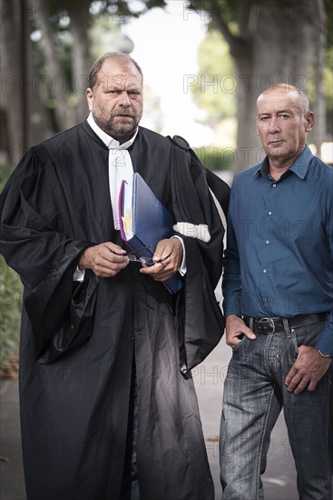 Loïc Sécher with his lawyer Eric Dupond-Moretti