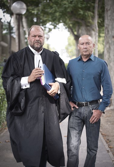 Loïc Sécher with his lawyer Eric Dupond-Moretti