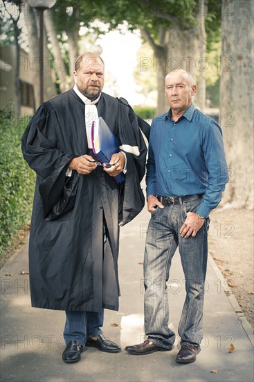 Loïc Sécher et son avocat Eric Dupond-Moretti