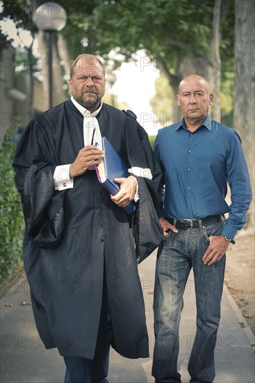 Loïc Sécher with his lawyer Eric Dupond-Moretti