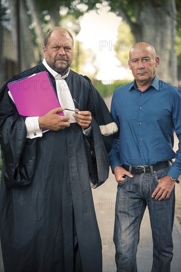 Loïc Sécher with his lawyer Eric Dupond-Moretti