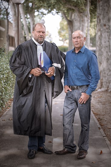 Loïc Sécher with his lawyer Eric Dupond-Moretti