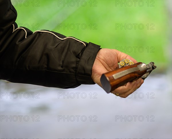 Loading ammunition for a handgun