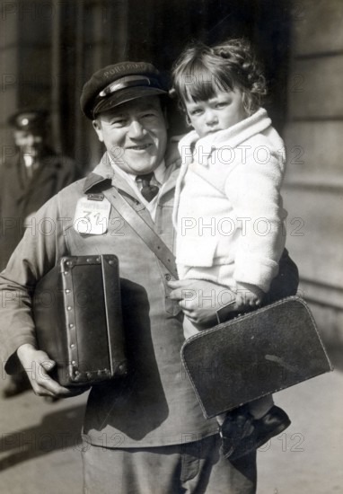 A porteur in a railway station during the Easter Holidays period