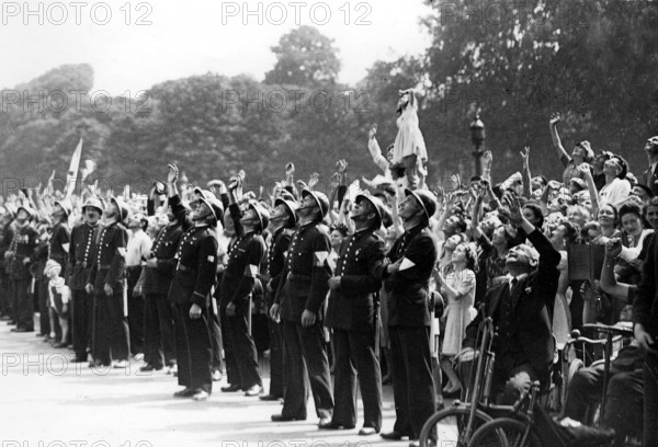 Scene of cheering crowd on the Champs-Elysées during the Liberation of Paris