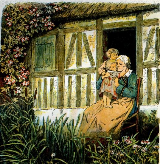 Grand-mère embrassant ses petits-enfants