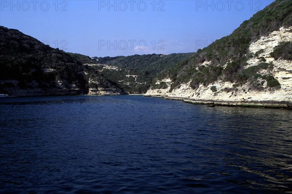 Rocky inlet in Bonifacio harbor, facing the city