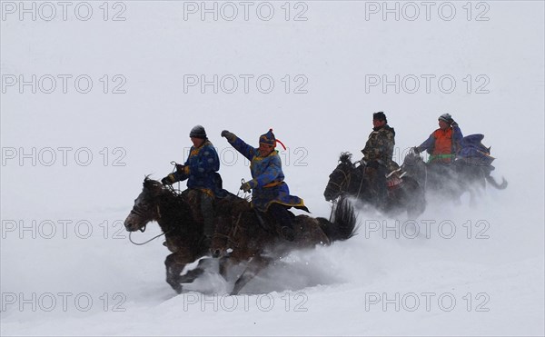 Hemu village (China),  Xinjiang : horse race during the Snow Festival for the New Year 2008